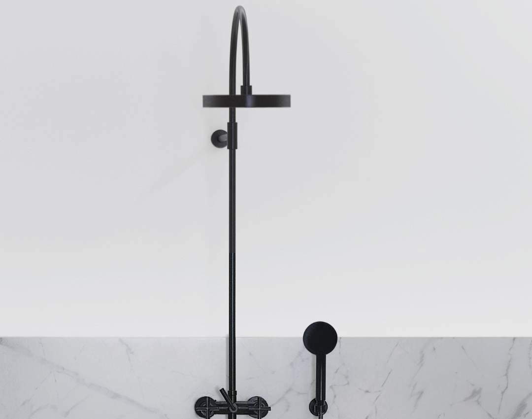 Dornbracht Tara wall-mounted rain shower system with handheld spray in matte black finish against marble tiling