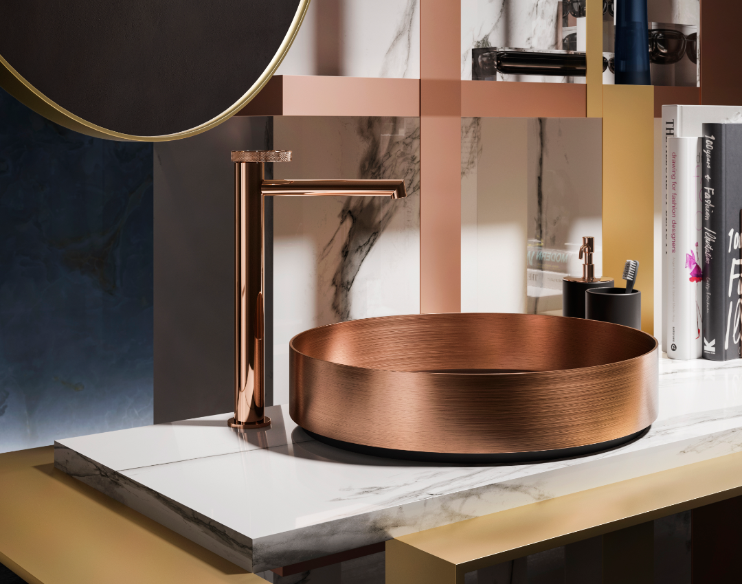 Designer Gessi copper countertop basin and tall mono basin mixer tap. Luxury bathroom design featuring a marble vanity, copper-toned geometric wall accents, and high-end metallic brassware.
