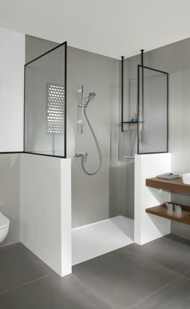 Modern Villeroy & Boch shower enclosure with glass panels and white base.